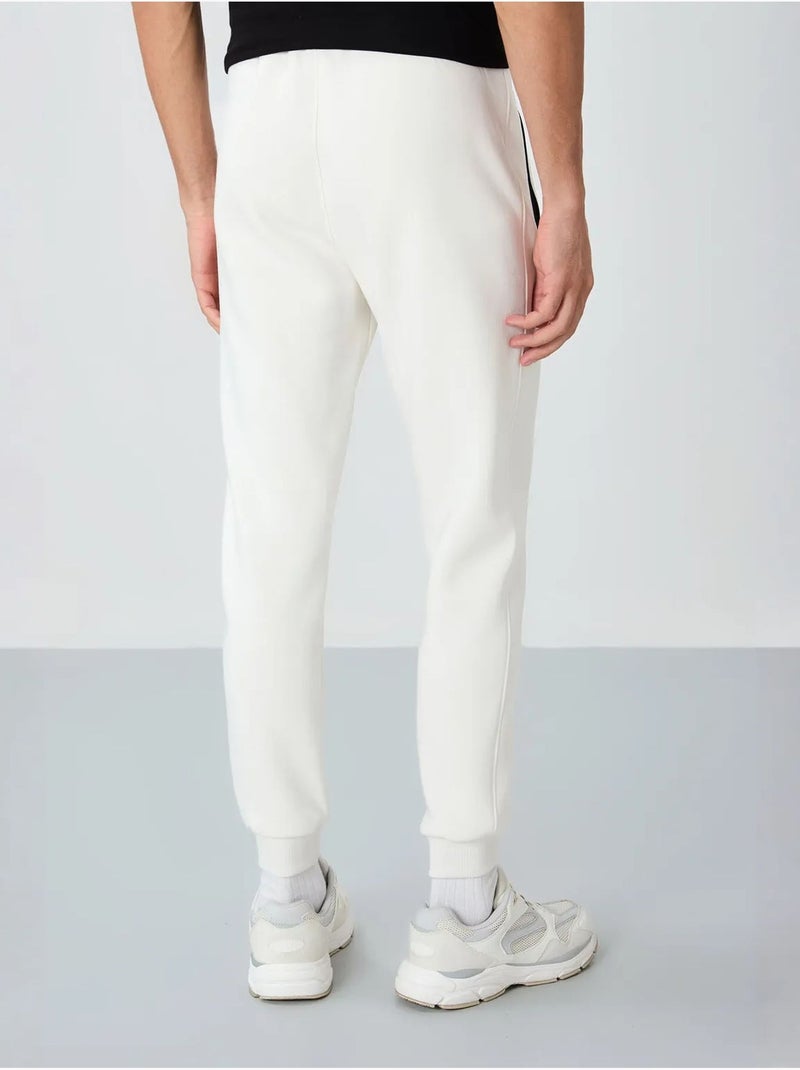Pantaloni della tuta jogger da uomo tommy Bianco sporco - Kiabi