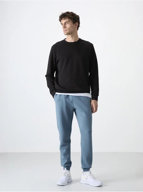 Pantaloni della tuta jogger slim da uomo tommy - Kiabi Pantaloni della tuta jogger slim da uomo tommy - Kiabi