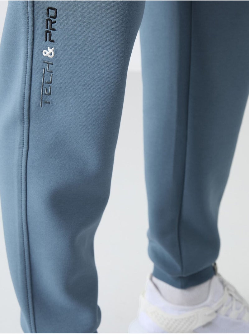 Pantaloni della tuta jogger slim da uomo tommy Blu zaffiro - Kiabi