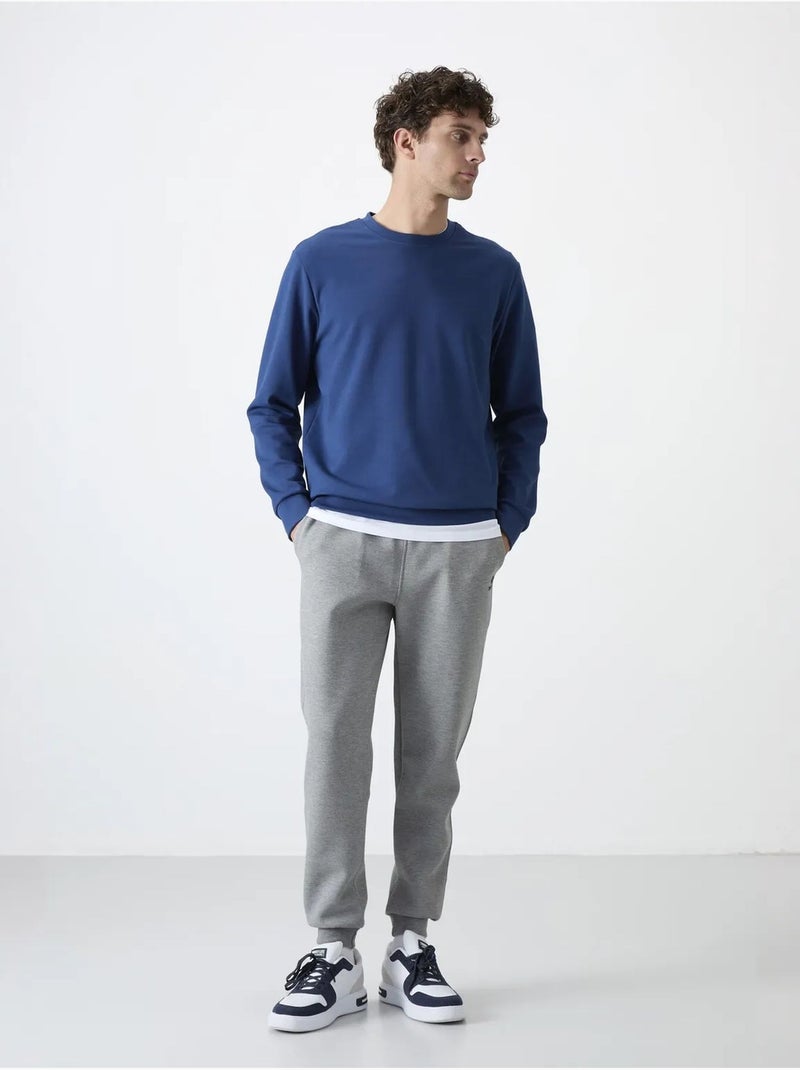 Pantaloni della tuta jogger slim da uomo tommy Grigio chiaro - Kiabi