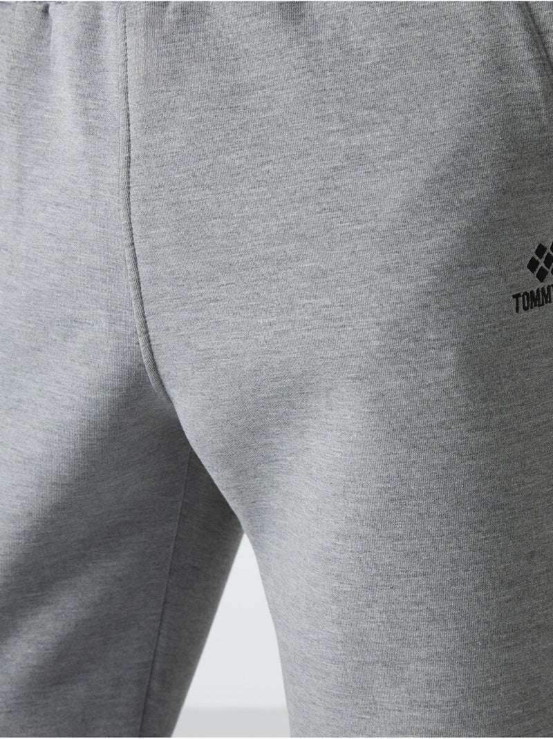 Pantaloni della tuta jogger slim da uomo tommy Grigio chiaro - Kiabi
