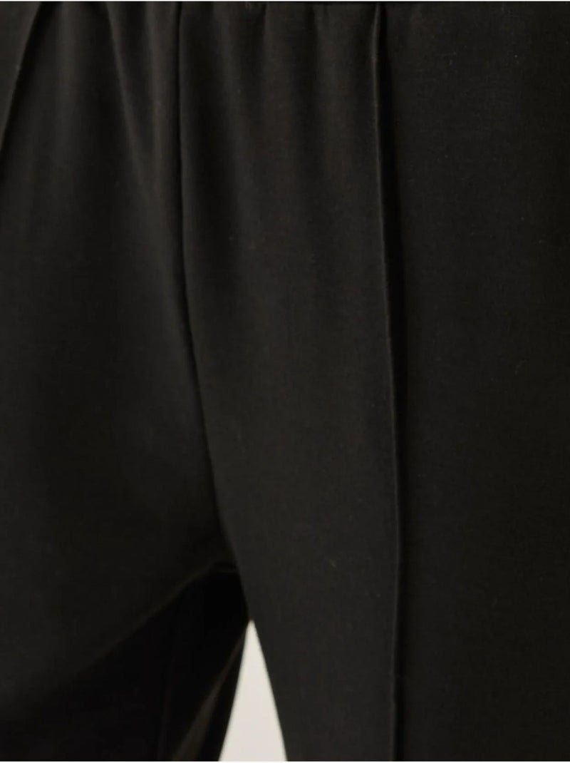 Pantaloni della tuta svasati Nero - Kiabi
