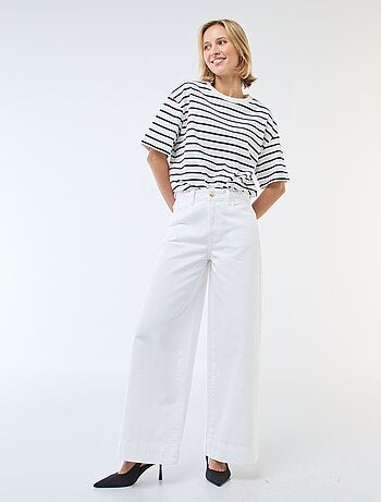 Pantaloni denim a vita alta e taglio ampio