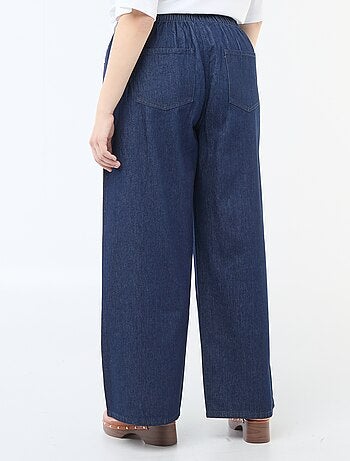 Pantaloni denim / jeans a vita bassa e taglio ampio