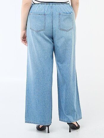 Pantaloni denim / jeans a vita bassa e taglio ampio