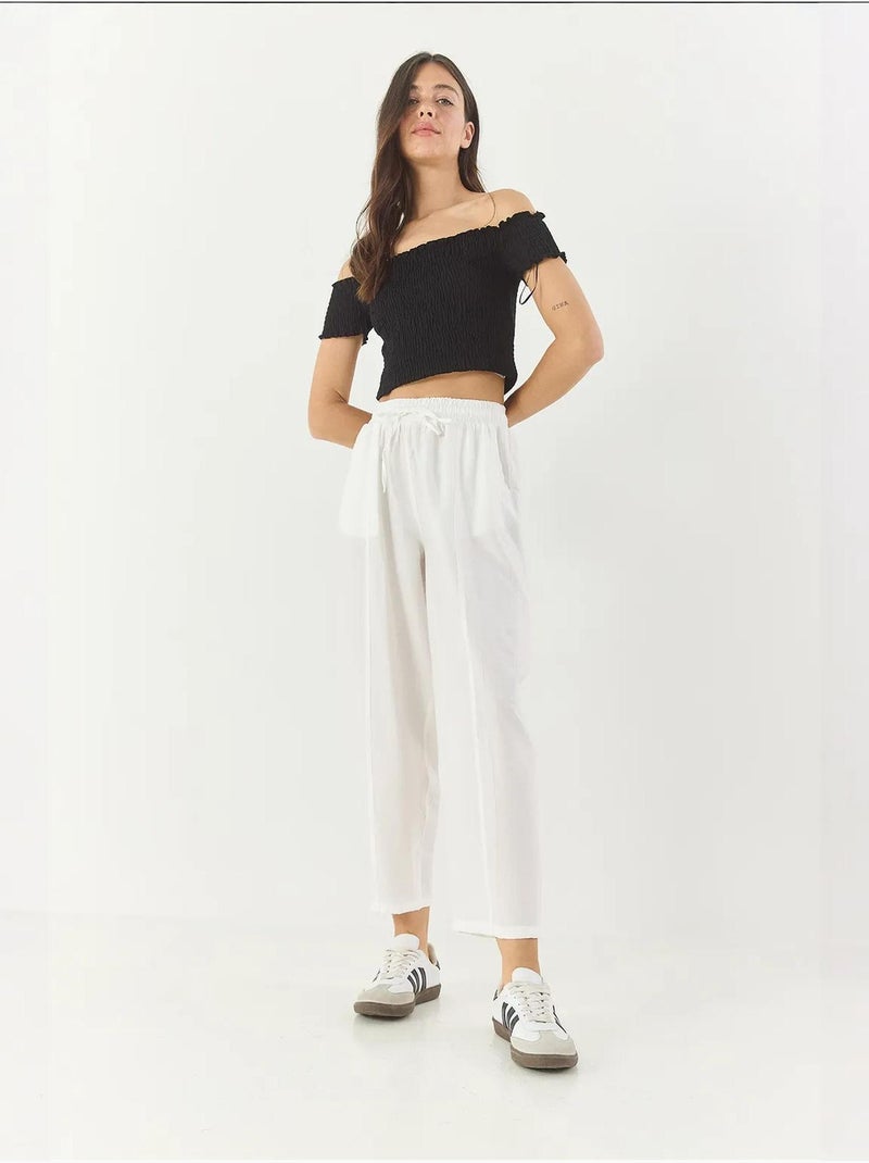 Pantaloni estivi con cintura e taglio carota e dettagli tascabili lucci Bianco - Kiabi