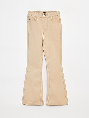 Pantaloni flare - Taglio + aderente