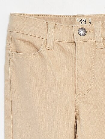 Pantaloni flare - Taglio + aderente