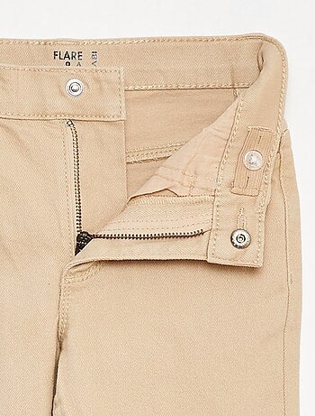 Pantaloni flare - Taglio + aderente