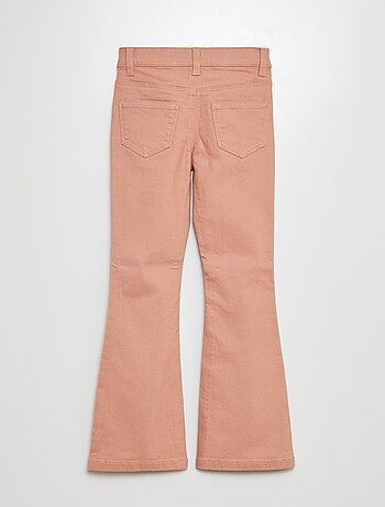 Pantaloni flare - Taglio + aderente