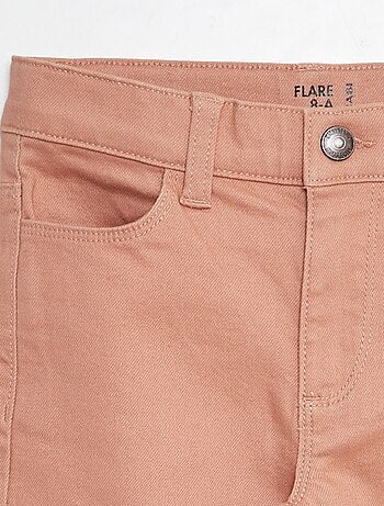 Pantaloni flare - Taglio + aderente