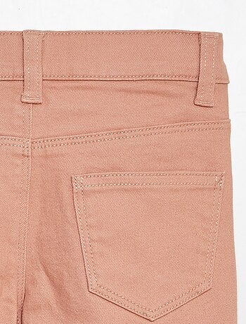 Pantaloni flare - Taglio + aderente