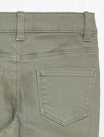 Pantaloni flare - Taglio + aderente