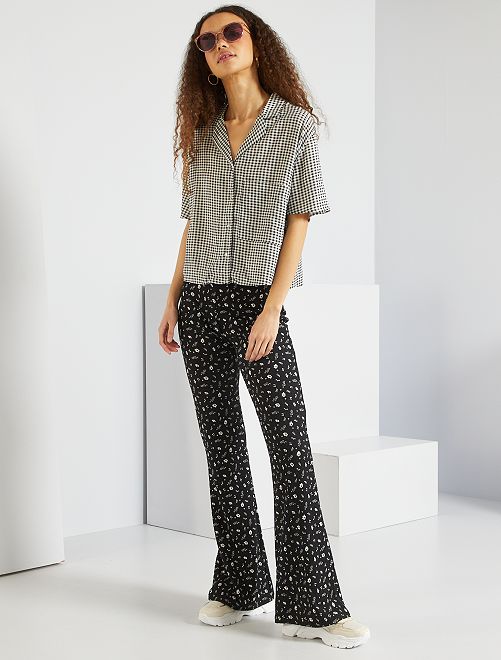 Pantaloni flare a fiori - NERO - Kiabi - 10.00€