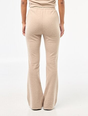 Pantaloni flare in maglia effetto peluche