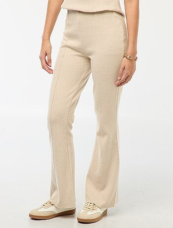 Pantaloni flare in maglia tinta unita