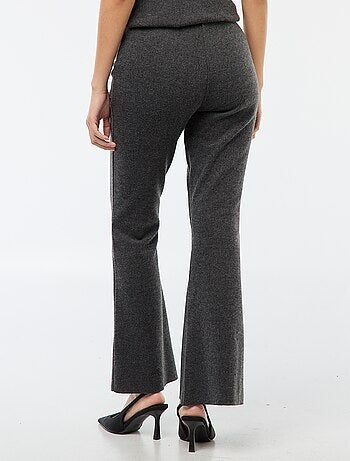 Pantaloni flare in maglia tinta unita