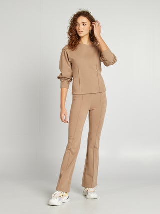 Pantaloni flare in tessuto stretch