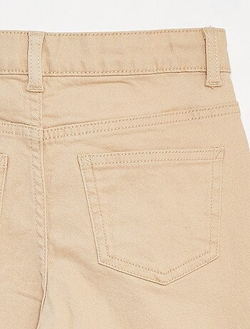 Pantaloni flare in twill con vita regolabile