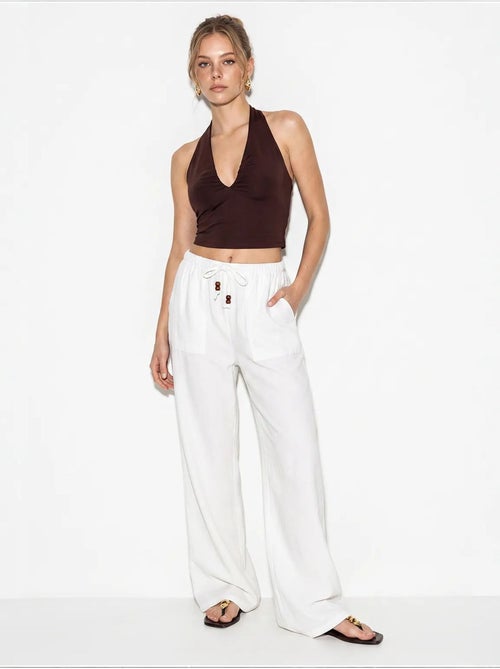Pantaloni in cotone a gamba ampia con vita con coulisse lucci - Kiabi Pantaloni in cotone a gamba ampia con vita con coulisse lucci - Kiabi