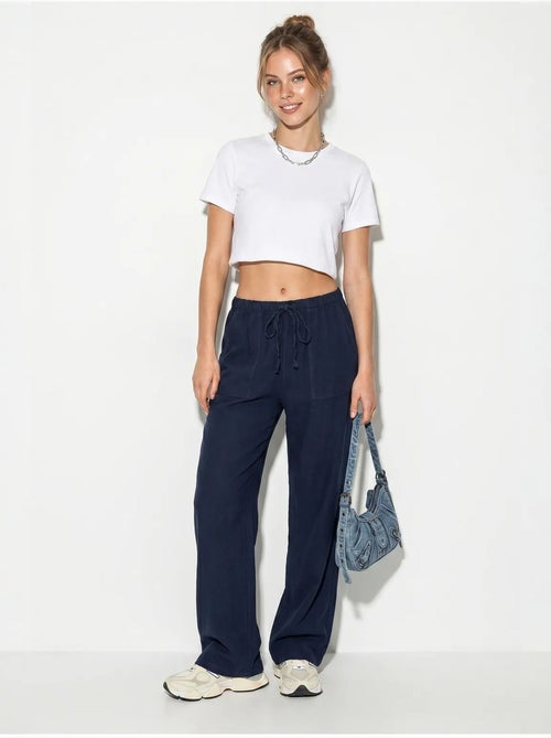 Pantaloni in cotone a gamba ampia con vita con coulisse lucci - Kiabi Pantaloni in cotone a gamba ampia con vita con coulisse lucci - Kiabi