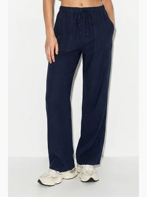 Pantaloni in cotone a gamba ampia con vita con coulisse lucci - Kiabi Pantaloni in cotone a gamba ampia con vita con coulisse lucci - Kiabi