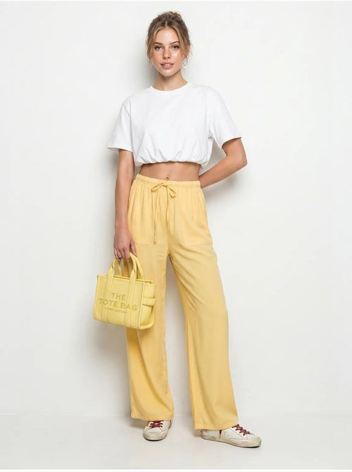 Pantaloni in cotone a gamba ampia con vita con coulisse lucci - Kiabi Pantaloni in cotone a gamba ampia con vita con coulisse lucci - Kiabi