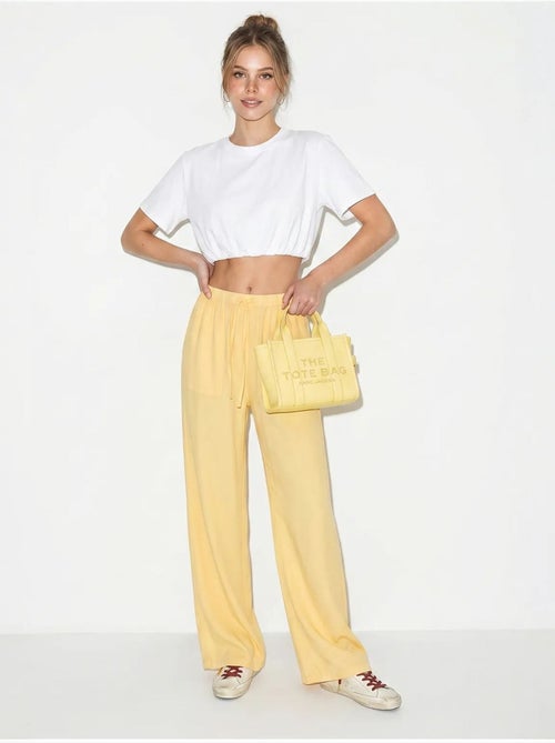 Pantaloni in cotone a gamba ampia con vita con coulisse lucci - Kiabi Pantaloni in cotone a gamba ampia con vita con coulisse lucci - Kiabi