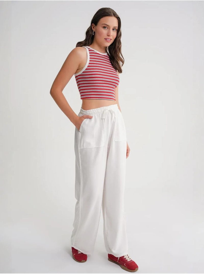 Pantaloni in cotone a vita media, gamba dritta e chiusura con laccetto mixray Bianco sporco - Kiabi