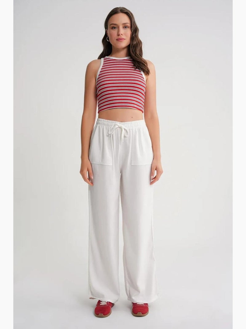 Pantaloni in cotone a vita media, gamba dritta e chiusura con laccetto mixray Bianco sporco - Kiabi
