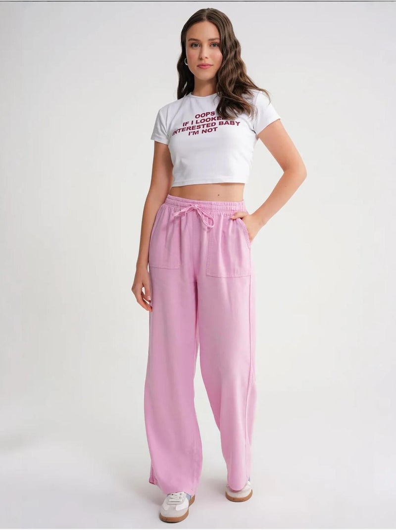 Pantaloni in cotone a vita media, gamba dritta e chiusura con laccetto mixray Rosa - Kiabi