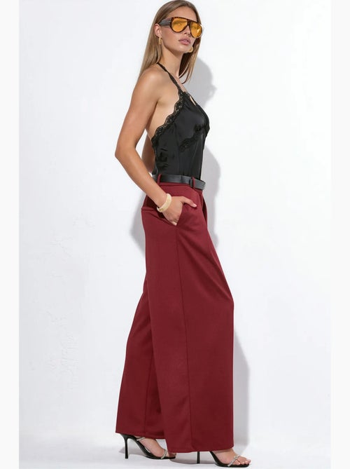 Pantaloni in crêpe a gamba ampia a vita alta con cintura busem - Kiabi Pantaloni in crêpe a gamba ampia a vita alta con cintura busem - Kiabi