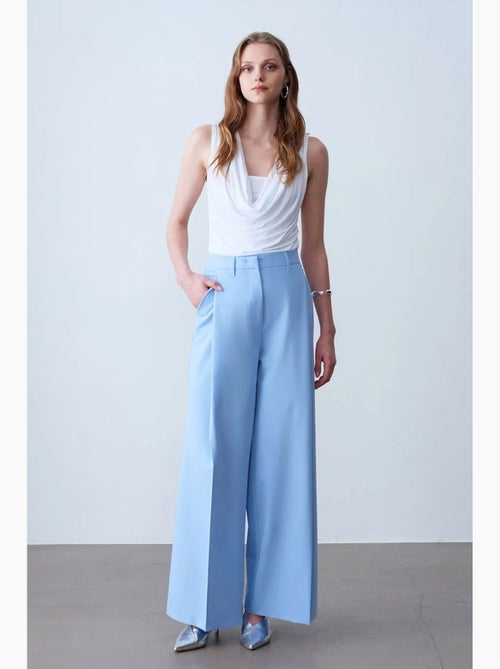 Pantaloni in crêpe a gamba ampia a vita alta dilvin - Kiabi Pantaloni in crêpe a gamba ampia a vita alta dilvin - Kiabi