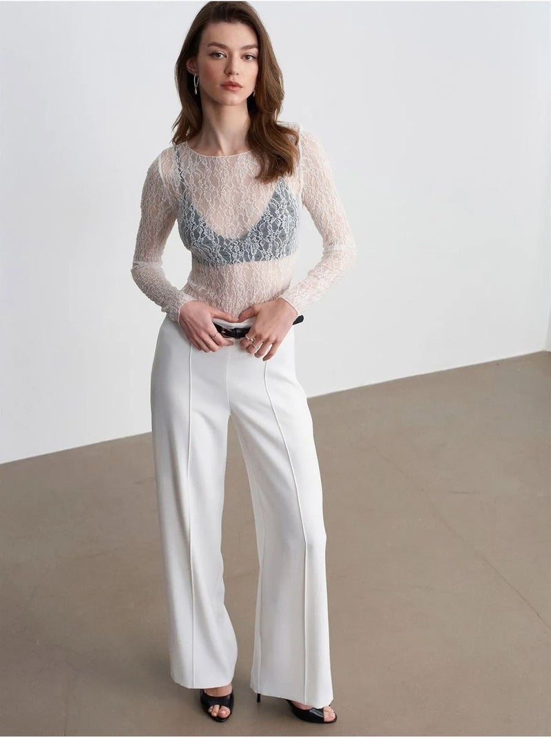 Pantaloni in crêpe a gamba ampia con cintura Bianco sporco - Kiabi
