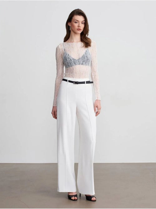 Pantaloni in crêpe a gamba ampia con cintura - Kiabi Pantaloni in crêpe a gamba ampia con cintura - Kiabi