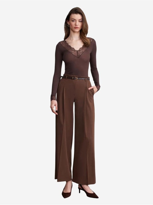 Pantaloni in crêpe a gamba ampia con cintura da donna dilvin - Kiabi Pantaloni in crêpe a gamba ampia con cintura da donna dilvin - Kiabi