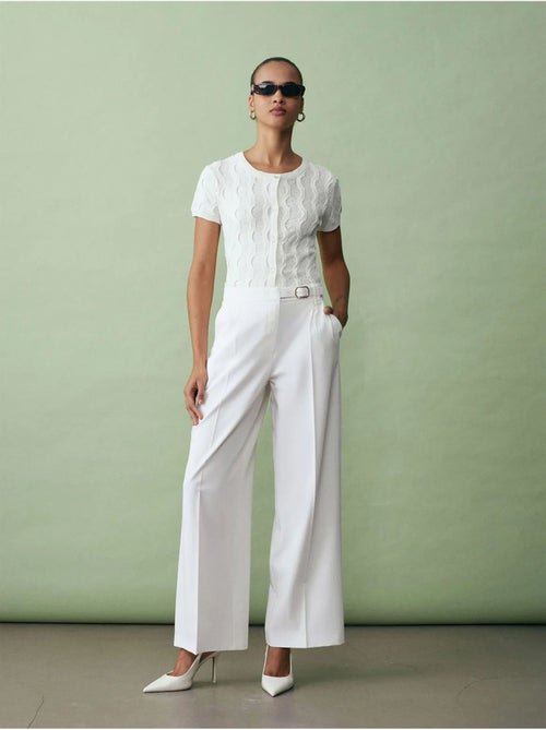 Pantaloni in crêpe a gamba ampia con cintura dilvin - Kiabi Pantaloni in crêpe a gamba ampia con cintura dilvin - Kiabi