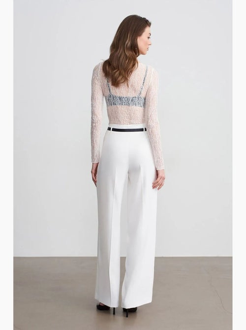 Pantaloni in crêpe a gamba ampia con cintura dilvin - Kiabi Pantaloni in crêpe a gamba ampia con cintura dilvin - Kiabi