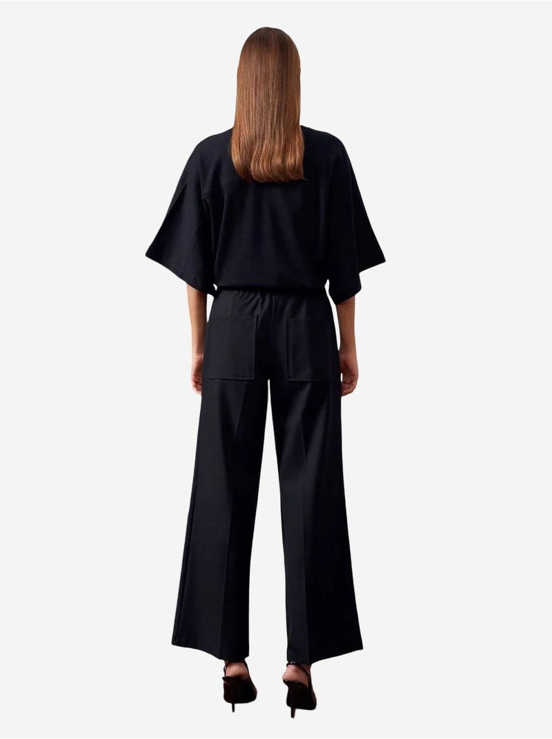 Pantaloni in crêpe a gamba ampia con cintura dilvin Nero - Kiabi