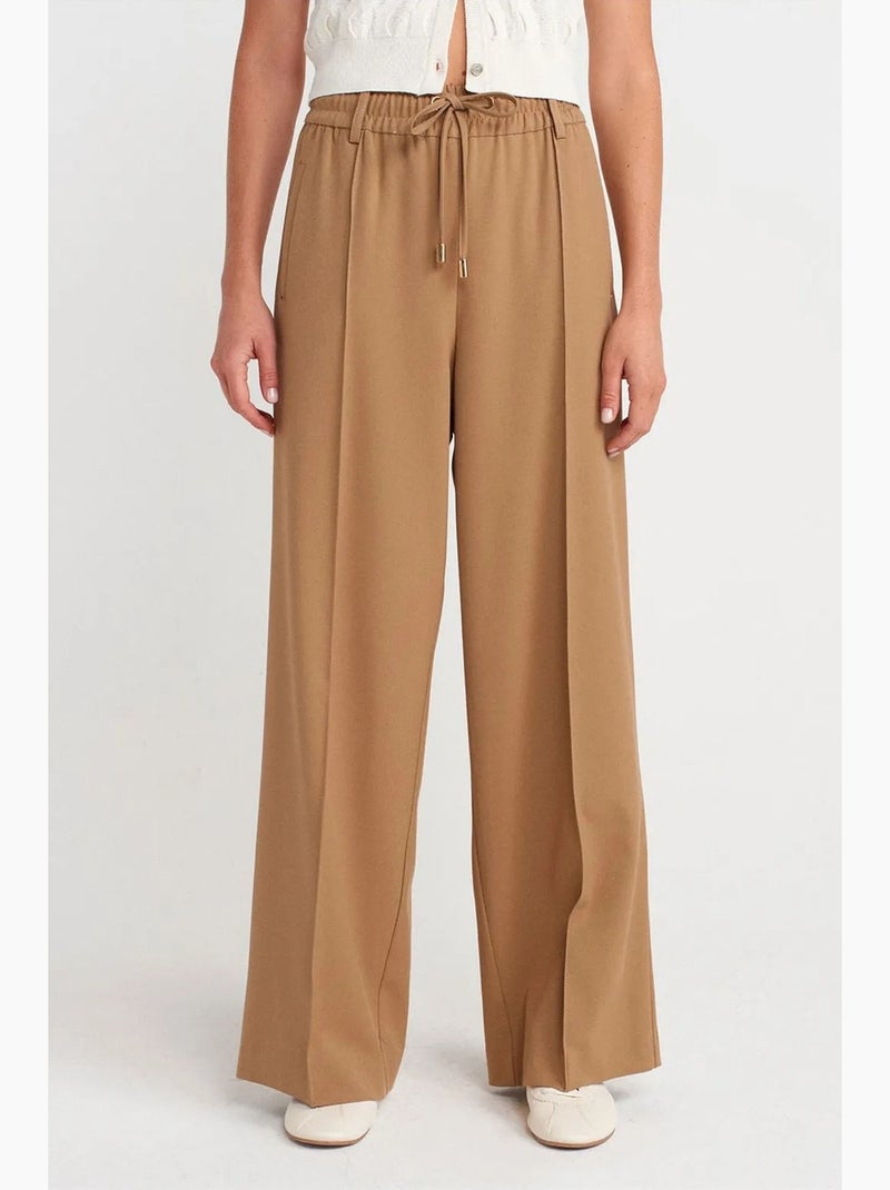 Pantaloni in crêpe a gamba ampia con vita con coulisse dilvin Cammello - Kiabi