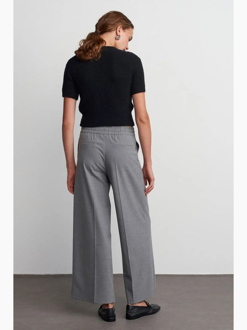 Pantaloni in crêpe a gamba ampia con vita con coulisse dilvin Grigio - Kiabi