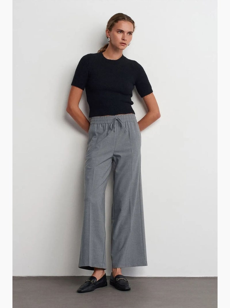 Pantaloni in crêpe a gamba ampia con vita con coulisse dilvin Grigio - Kiabi