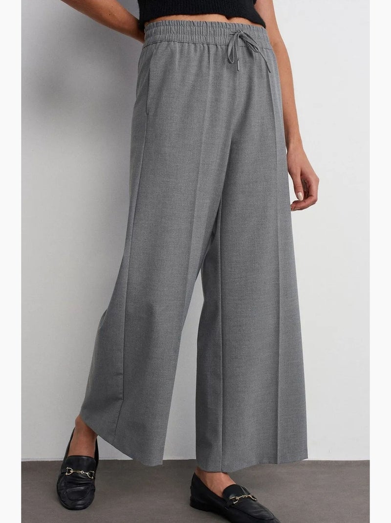 Pantaloni in crêpe a gamba ampia con vita con coulisse dilvin Grigio - Kiabi