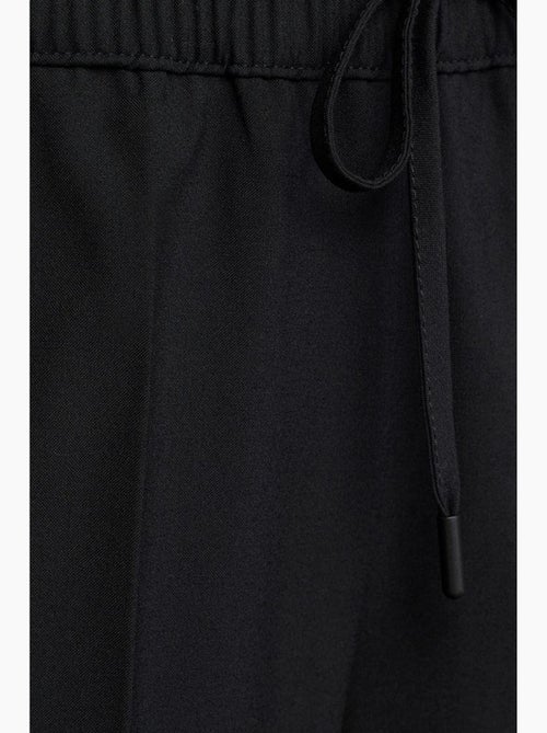 Pantaloni in crêpe a gamba ampia con vita con coulisse dilvin - Kiabi Pantaloni in crêpe a gamba ampia con vita con coulisse dilvin - Kiabi