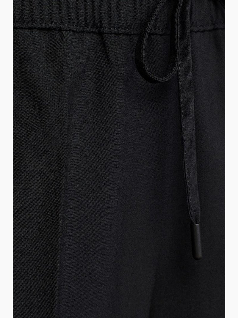 Pantaloni in crêpe a gamba ampia con vita con coulisse dilvin Nero - Kiabi