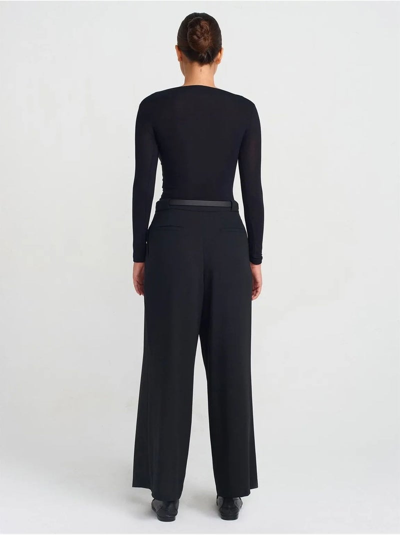 Pantaloni in crêpe a gamba ampia da donna con cintura dilvin Nero - Kiabi
