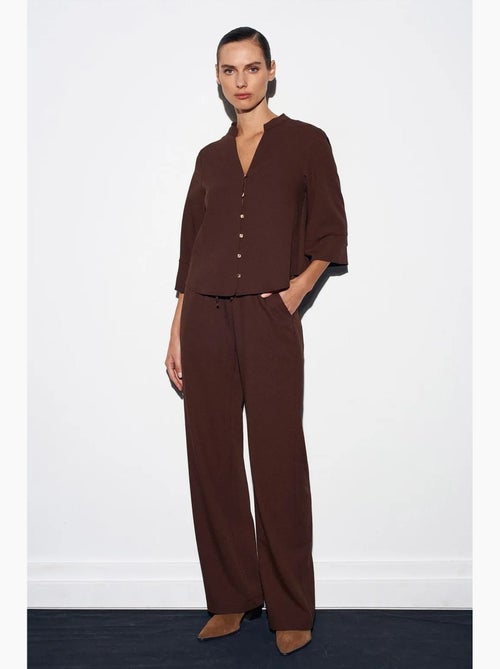 Pantaloni in crêpe a gamba ampia da donna dilvin - Kiabi Pantaloni in crêpe a gamba ampia da donna dilvin - Kiabi