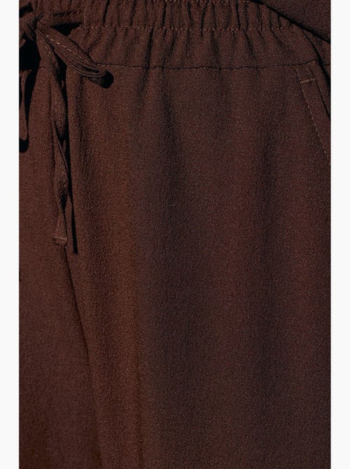 Pantaloni in crêpe a gamba ampia da donna dilvin - Kiabi Pantaloni in crêpe a gamba ampia da donna dilvin - Kiabi