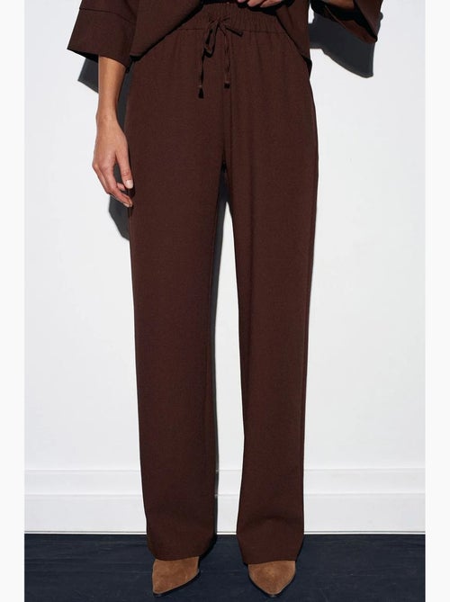 Pantaloni in crêpe a gamba ampia da donna dilvin - Kiabi Pantaloni in crêpe a gamba ampia da donna dilvin - Kiabi