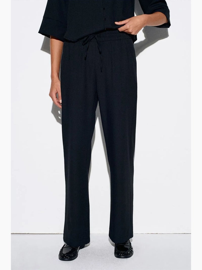 Pantaloni in crêpe a gamba ampia da donna dilvin Nero - Kiabi